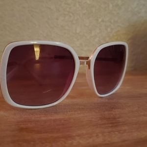 Gently used white sunglasses